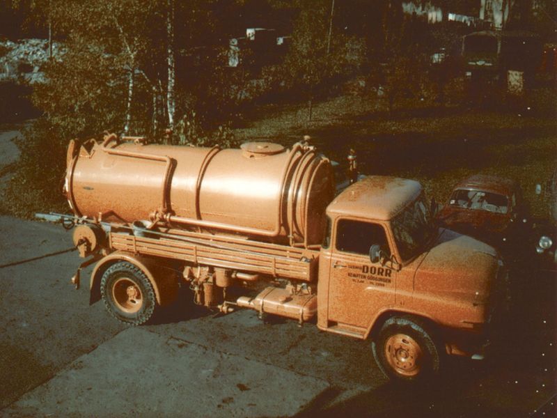 dorr-historie-kempten-slider-transporter-in-orange-und-logo